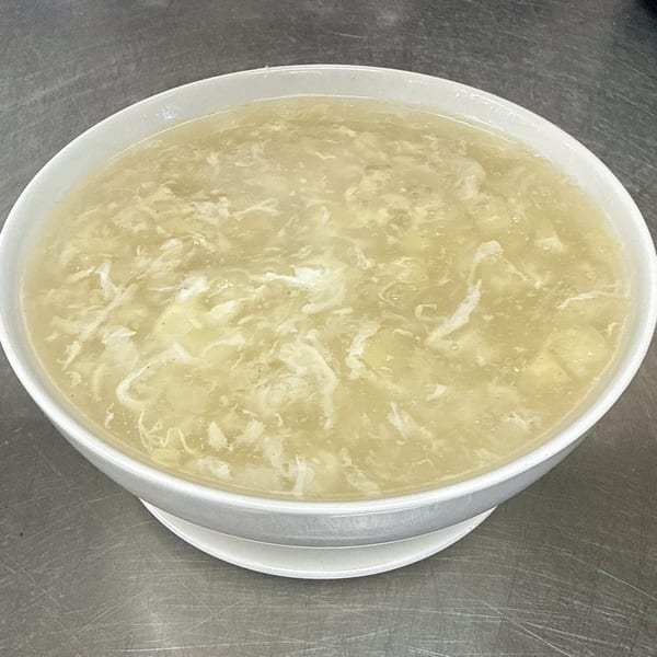 A large white bowl of Gourmet Asian 888's Chinese egg drop soup with visible egg strands.